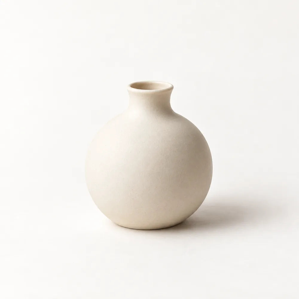 Rounded matte ivory bud-vase concept